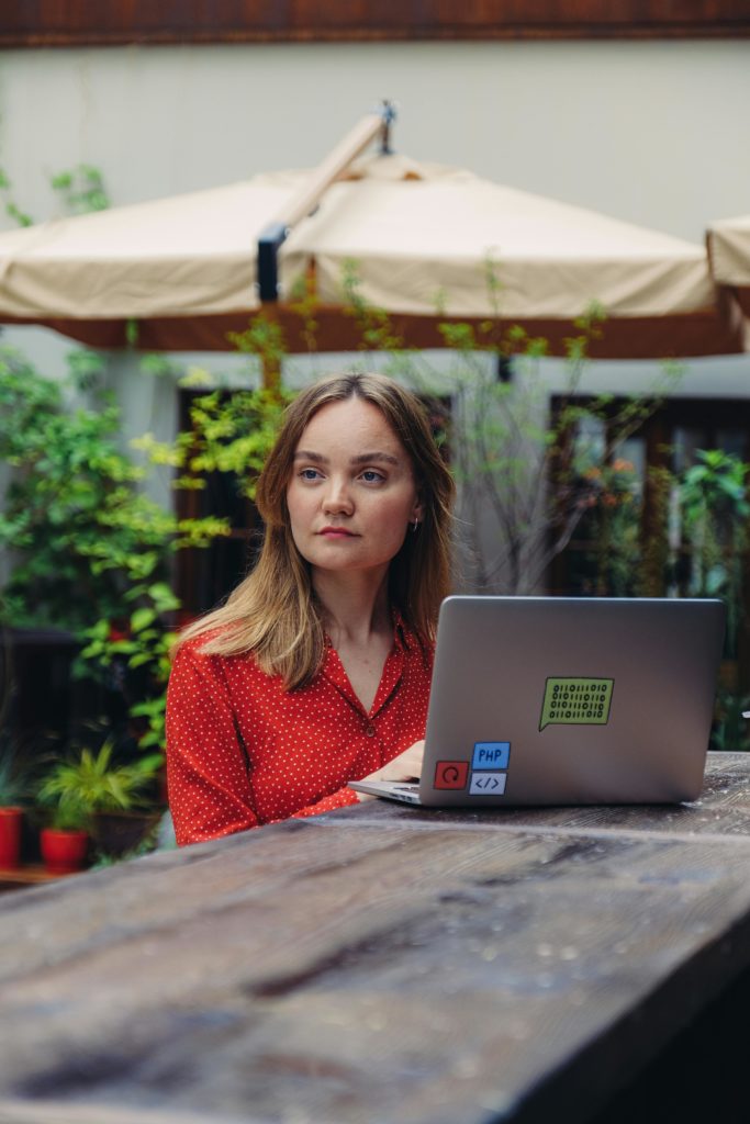 Person with laptop sitting